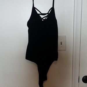 Black cross up body suit